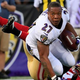 Running back Ray Rice of the Baltimore Ravens loses his helmet after being tackled by strong safety Antoine Bethea of the San Francisco 49ers during the first half of an NFL preseason game at M&T Bank Stadium Aug. 7, 2014, in Baltimore.
Rob Carr/Getty Images